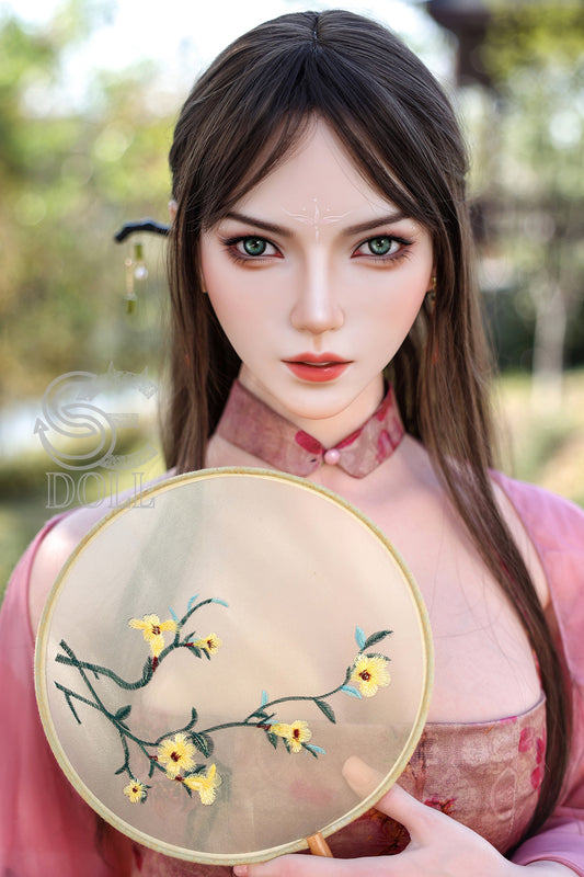 Bridget C. 163cm C Cup Silicone Sex Doll by SEDOLL in seductive outdoor pose.