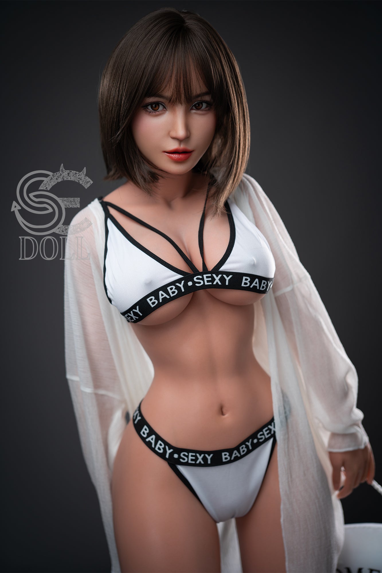 Petite Asian love doll with athletic figure and erotic pose