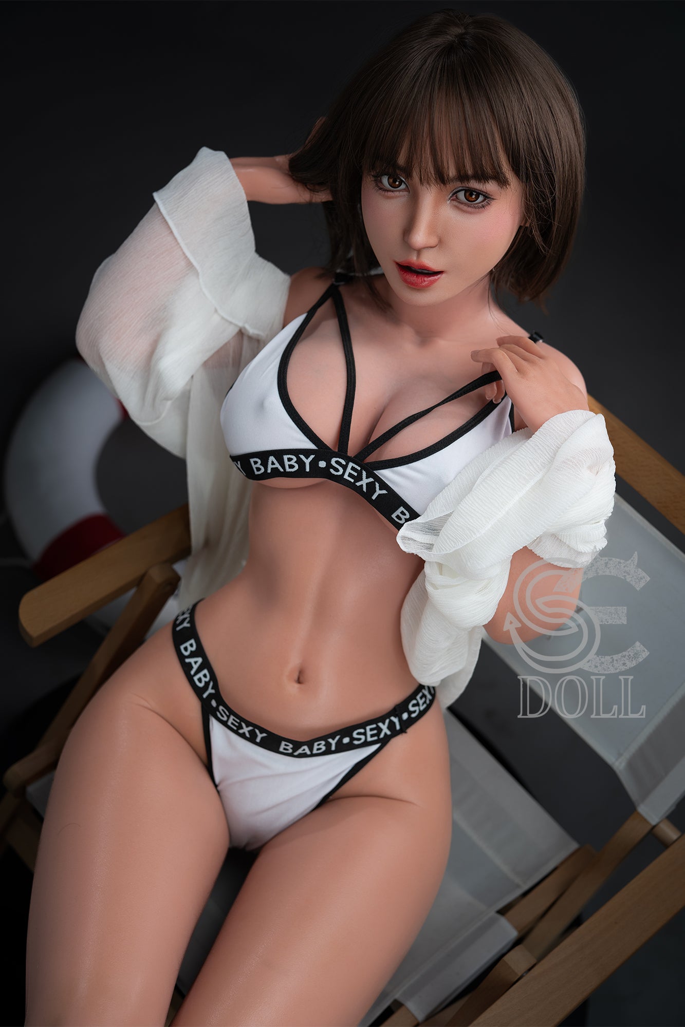 Asian goddess sex doll with short black hair, brown eyes, and irresistible curves.