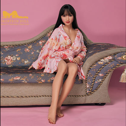 Yumiko 154cm F Cup TPE Sex Doll by Irontech seated on sofa – lifelike Asian sex doll