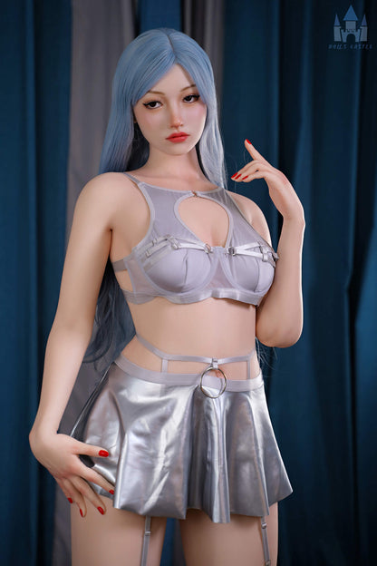 Close-up of Carny’s face with blue hair and white skin – realistic sex doll