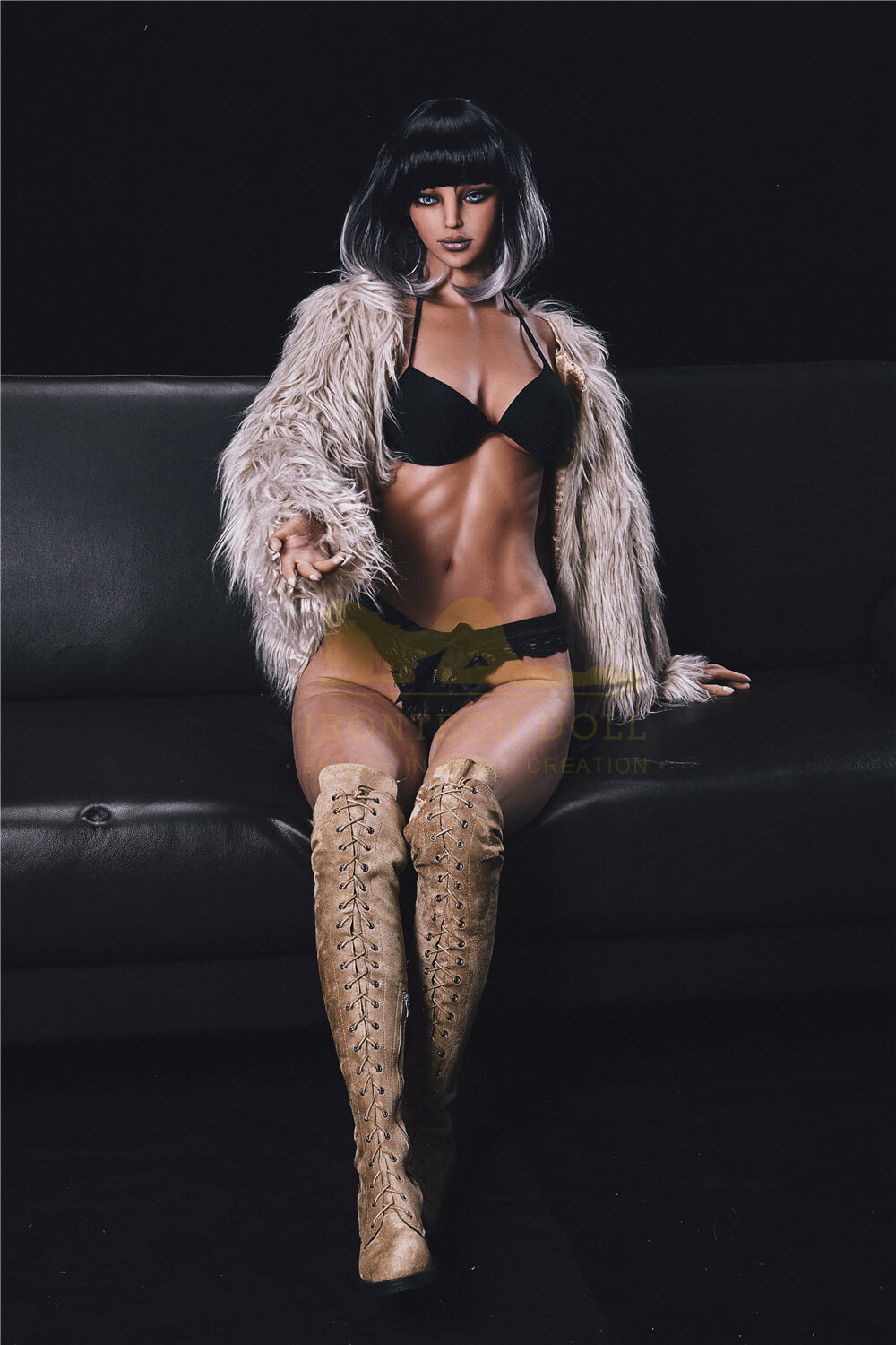 Emily 168cm Irontech sex doll with a tan complexion and athletic abs wearing a fur coat.