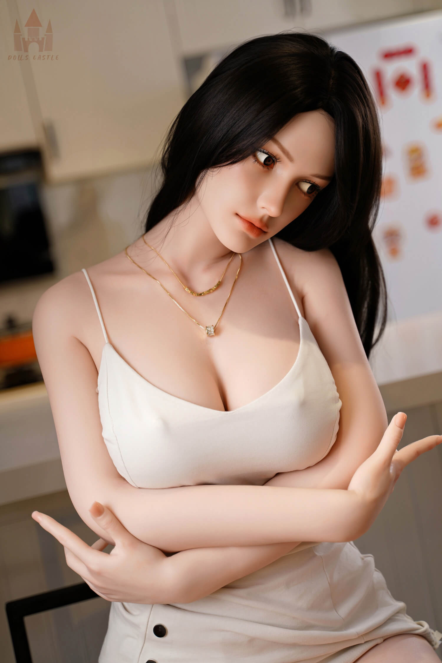 Side view of Kimora silicone sex doll highlighting E cup breasts and curves.